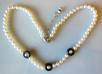 Hematite Circles on white pearls-0